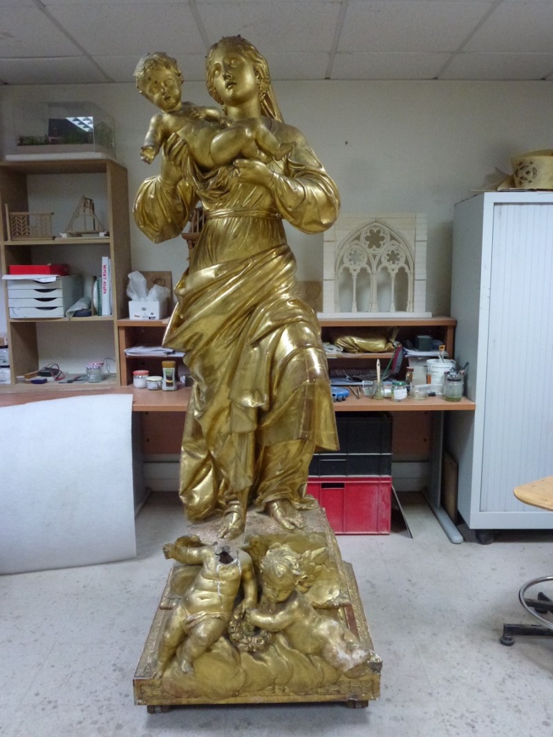 Atelier Giordani - Conservation - Restauration
Edifice – Mobilier - Sculpture – Objets d’art – Moulage –
Pierre, bois métal, polychromie et dorure - Restauration et soclage de la Vierge à l’Enfant - Bois doré, mixtion et détrempe - OPÉRATIONS RÉALISÉES
- Nettoyage chimique 
- Mastics traditionnels craie-colle et modostucs®
- Consolidation du  bois
- Restitution et compléments par moulage
- Réintégration à la feuille d’or et patine d’harmonisation
- Réintégrations colorées à l’or minéral 
- Réalisation d’un socle mobile en chêne teinté qui encastre et conserve le système d’origine