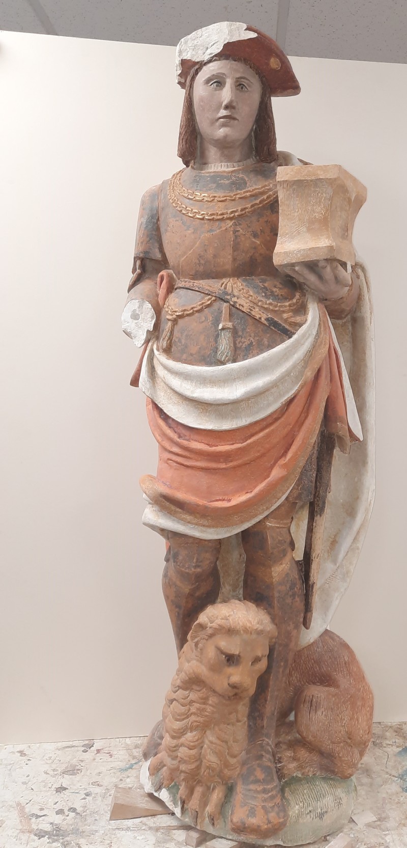 Atelier Giordani - Conservation - Restauration
Edifice – Mobilier - Sculpture – Objets d’art – Moulage –
Pierre, bois métal, polychromie et dorure - Restauration et dégagement de la statue de Saint Adrien - Pierre polychrome - - Traitement du support
- Dépoussiérage	
- Dégagement de polychromie	
- Refixage polychromie	
- Nettoyage	
- Masticage	
- Retouche et réintégration colorée