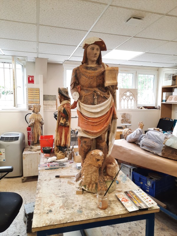 Atelier Giordani - Conservation - Restauration
Edifice – Mobilier - Sculpture – Objets d’art – Moulage –
Pierre, bois métal, polychromie et dorure - Restauration et dégagement de la statue de Saint Adrien - Pierre polychrome - - Traitement du support
- Dépoussiérage	
- Dégagement de polychromie	
- Refixage polychromie	
- Nettoyage	
- Masticage	
- Retouche et réintégration colorée